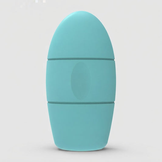A light blue-green silicone personal massager with a rounded, egg-shaped design and a central oval button, shown on a neutral light gray background.