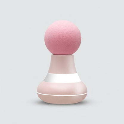 A pink and white massage or beauty device with a rounded pink head on a smooth, tapered pink base, set against a solid light gray background.